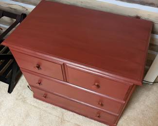 F27 - $65. Small Red Dresser. Measures 28.5" wide, 17" deep, 26" tall
