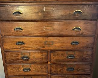 F25 - $895. 15 Drawer Flat File - solid wood. Measures 41" tall, 20" deep, 60" tall. All drawers slide. In very good condition!