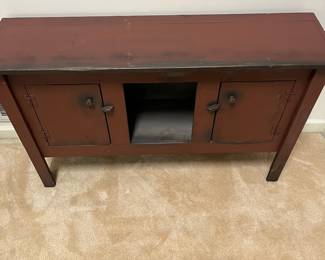F16 - $150. Console Table. Center is open and both sides open for stdorage. Measures 51.5" x 14" deep x 32.5" tall.