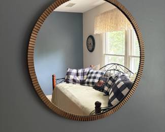 F36 - $75. Fluted Wall Mirror. Measures 20" round