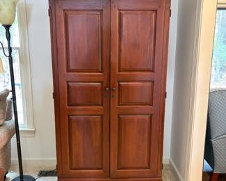 F32 - $125. Armoire. Measures 44.75" wide, 23.5" deep, 76.25" tall. Has been used for linen storage. In very good condition.