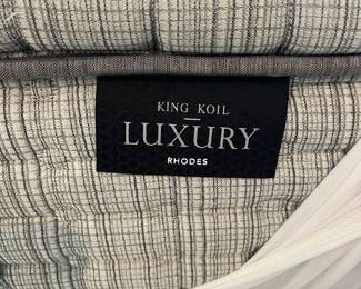 F68 - $250. Queen Bed. Headboard Measures 64" x 38.5" tall. Includes clean King Koil Luxury Mattress if you want it! Does NOT use a box spring.