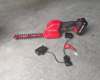 F105 - $50. Craftsman Battery Powered Hedge Trimmers with charger & 1 battery.