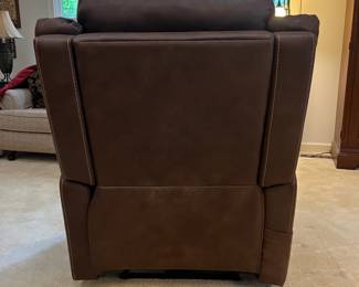 F12 - $400. Ashley Furniture Power Recliner with remote. Brown. Adjustable Lumbar and Headrest. Measures 36" wide x 37" deep x 42.5" tall.