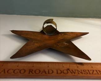 F94 - $30. Copper Star - maybe a tree topper? Has big loop on the back.