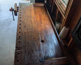 F99 - $1,750. Antique Carpenter's Bench. Has been used in the house as a decoration, serving station, and was moved out to sell the home. CLEAN! and in beautiful antique condition!