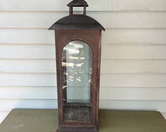 F72 - $15. Decorative Lantern. Measures 10" square x 30.5" tall.
