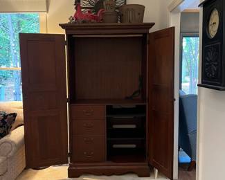 F32 - $125. Armoire. Measures 44.75" wide, 23.5" deep, 76.25" tall. Has been used for linen storage. In very good condition.