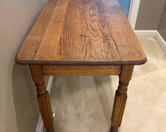 F22 - $85. Antique Wooden table/Desk with single drawer. Measures 36.5" wide x 24" deep x 29" tall.