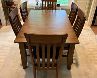 F1 - $450. Dining Table + 6 Chairs with 2 Butterfly Leaves. Table is 63.5" x 38" x 29" tall. Each leaf adds an additional 18". Table + Chairs are in excellent condition. Chairs are 19" wide x 20" deep x 40.5" tall. Floor to Seat is 19.5".