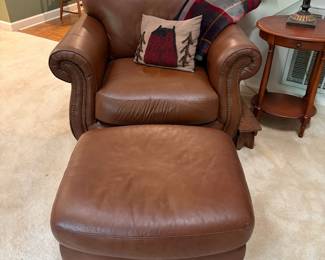 F4 - $795. Robinson & Robinson Leather Chair & Ottoman with antiqued nailhead trim. Both pieces are in excellent condition. Very comfortable!Chair measures 44" x 36" x 36.5" tall. Floor to seat is 19". Ottoman measures 29" wide x 25.5" deep x 17" tall.