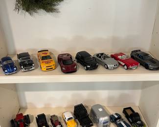 F115 - $80. Mixed Lot of Die Cast 1:24 Cars and Trucks. Brands Include: Burago, Maisto, Welly, Racing Champion, Kinsmart, and Wix.