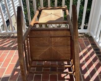 F73 - $85. Wooden Rocking Chair that was used on the covered porch. Measures 26.5" x 34" x 46" tall.