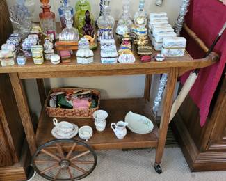 Teacart with perfume boxes and bottles