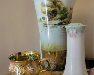 Gilded cup and saucer.  Hand painted Nippon