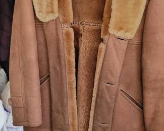 Fur lined leather coat