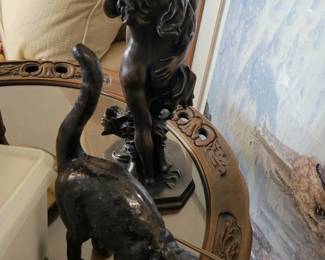 Cast iron cat and couple