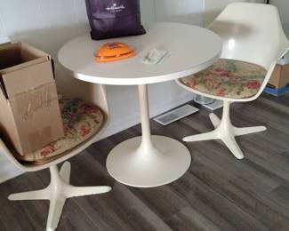 Tulip table and chairs by Burke