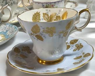 Royal Albert Teacup and Saucer, Pale Blue with Gold Leaves and Flowers