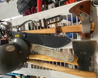 Nice collection of machetes, axes , 