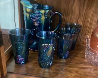Carnival glass and pitcher set