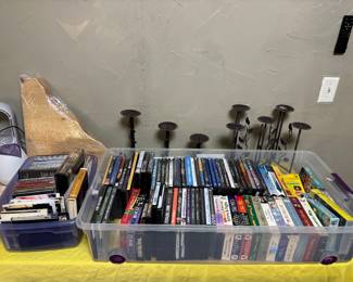VHS, DVDs, candles and candlesticks 