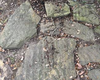 Landscaping rocks!  You must pick them up and load yourself 