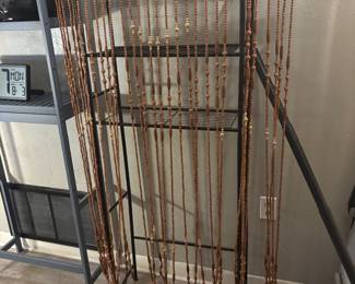 Beaded door and over the  toilet shelf 