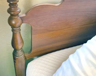 Finial detail on one of two antique twin beds