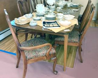 Mid-century dining table with 8 high-back chairs