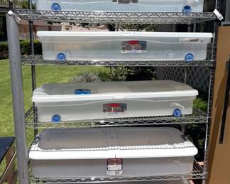 Metal shelving on wheels, plastic under the bed storage bins also with wheels