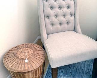 High-backed tufted chair