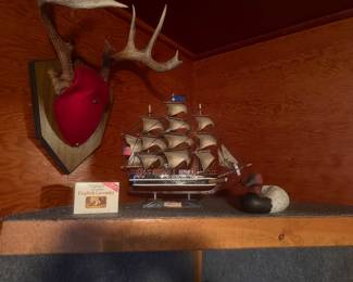 Antlers, ship and duck