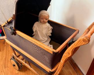 Antique pram and doll