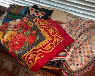 100+ scarves. Fine designers