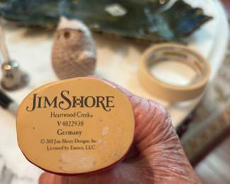 At least three highly collectible Jim Shore Santas