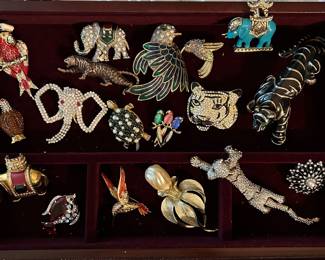A portion of her beautiful brooches.