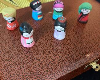 Precious little Oriental figures.