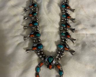 Sterling squash blossom necklace.