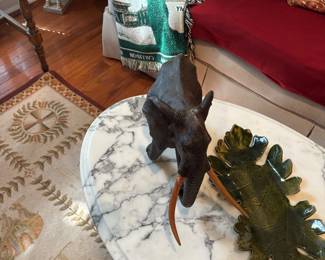 Handmade pottery piece on marble topped coffee table.