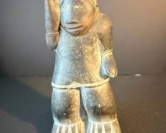 Inuit Stone Carving of a Standing Figure with a Drum