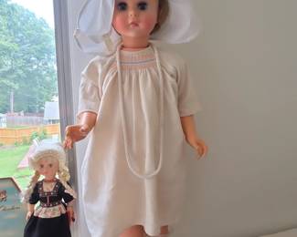 Vintage Large Vinyl Character Doll with Bonnet and Smocked Dress