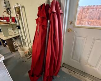 Red umbrellas for vintage concrete stands
