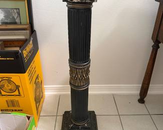 Black and gold marble pedestal