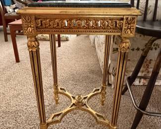 Gold finish with black marble top table
