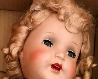 Peggy walking doll face close up.