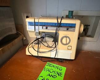 Sewing Machine with the Instruction Book and Cabinet