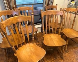 Six Matching Hard Wood Chairs