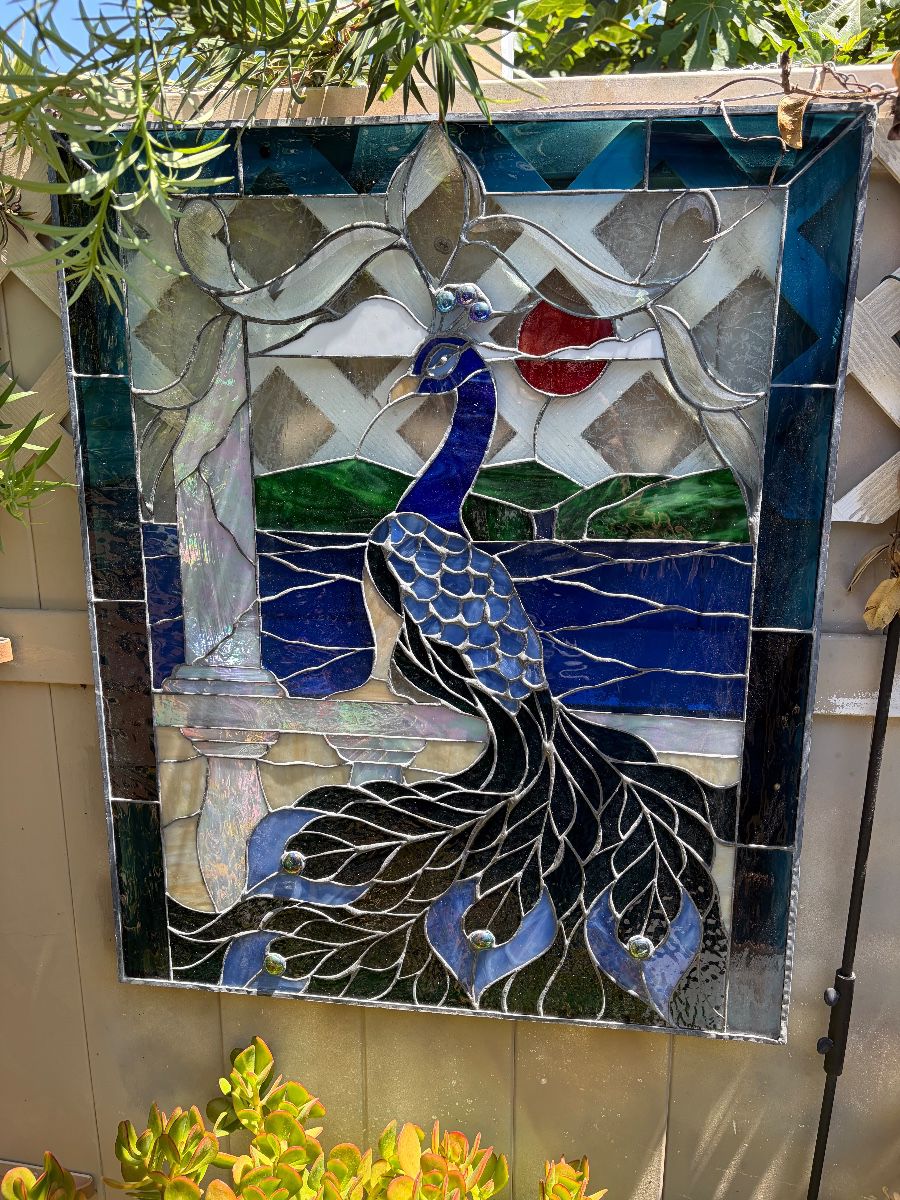 Stunning peacock stained glass panel