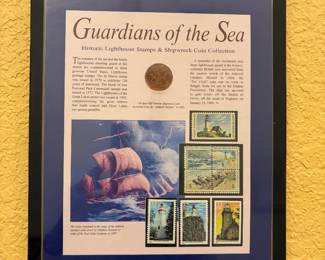 Guardians of the Sea" framed display with a genuine 1808 East India Company "Ten Cash" copper coin recovered from the shipwreck of the Admiral Gardner (which ran aground in 1809), alongside a collection of commemorative U.S. lighthouse postage stamps.
